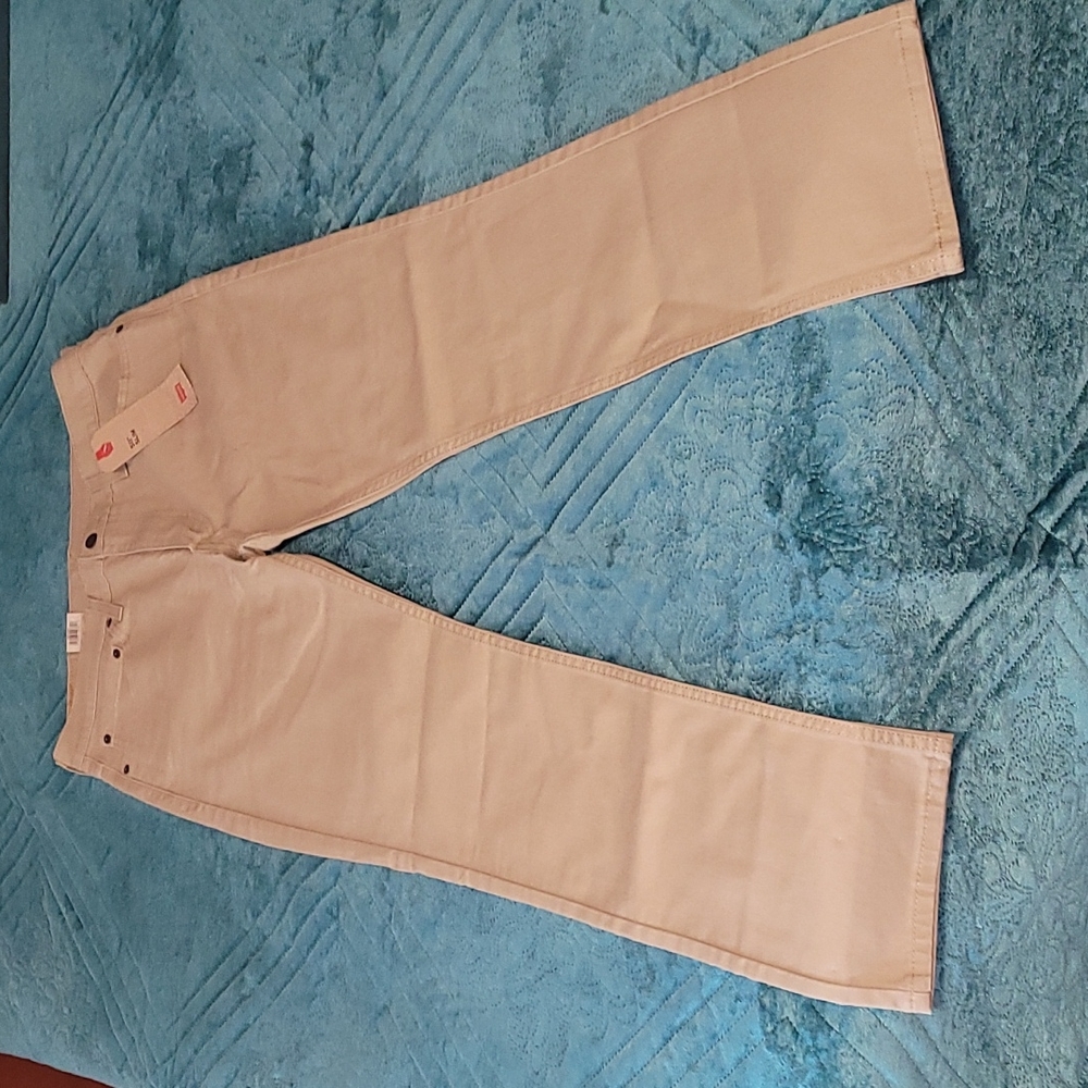 Levis, size 34x30, khaki colored jeans.
